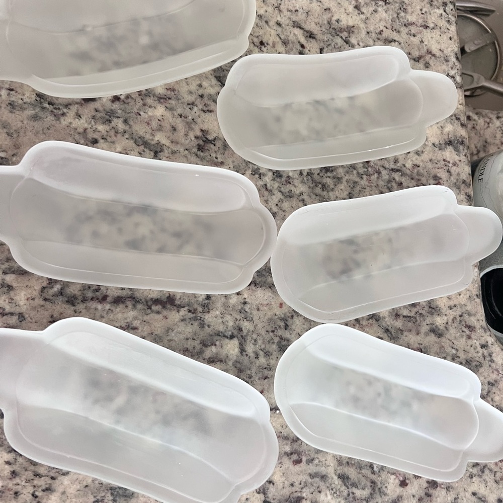 These are vintage frosted glass banana split dishes.